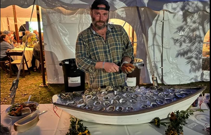 Two Rock Oysters Farm oysters served at a raw bar table in Massachusetts.